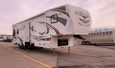 Heartland Cyclone 3812 Toy Hauler Triple Slide Fifth Wheel with Garage & Residential Comfort! 2012 H...