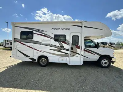 Thor Motor Coach Four Winds Class C gas motorhome 22E highlights: Queen Bed Cab Over Bunk 40in.in. T...