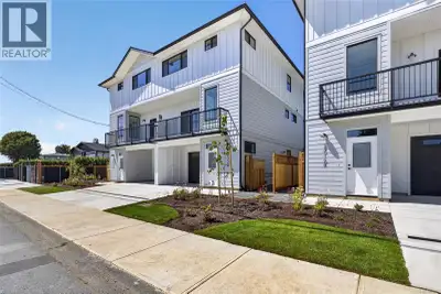 This brand new move in ready home is the first of six thoughtfully designed half-duplex homes is per...