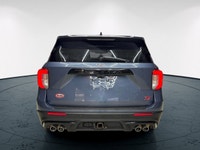 The 2021 Ford Explorer ST in striking blue is a 44 SUV that offers an impressive blend of power and... (image 5)