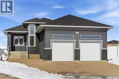 Welcome to your dream home in Regina's desirable east end! This premium custom-built bungalow blends...