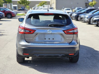 The 2023 Nissan Qashqai SV in a striking color, equipped with an automatic transmission and an all-w... (image 3)