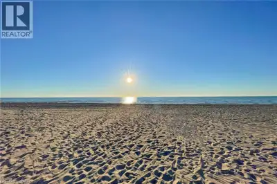 Turnkey investment & dream 4-season beach retreat in Grand Bend! Fully furnished and currently opera...