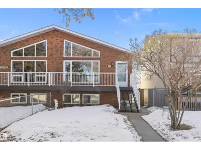 STUNNING! Completely renovated half duplex with self contained inlaw suite which front and backs gre...