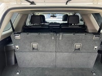 The 2015 Toyota 4Runner 4WD 4dr V6 SR5, in its striking White exterior paired with a robust 44 drive... (image 9)