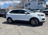 Command every journey in this pristine white 2024 Ford Edge SEL, boasting a sophisticated All-Wheel... (image 1)