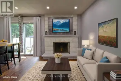 Step into this bright, updated two-bedroom ground-level unit on the lower second backsplit level, wh...