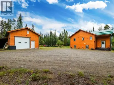 Country residential living within city limits! Situated on 3.46 acres & backing onto Wolf Creek, thi...