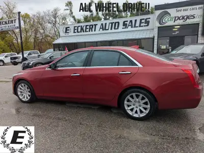 Cruise the Canadian roads in style and luxury with this stunning red 2015 Cadillac CTS Luxury AWD, n...