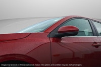 The 2024 Nissan Sentra SV CVT is a stunning red, front-wheel-drive sedan that promises to deliver a... (image 3)