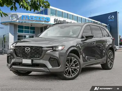 The stunning 2026 Mazda CX-70 PHEV GT AWD in a sophisticated gray finish captures both the eye and t...