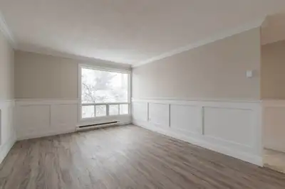 This beautiful renovated 1 bedroom apartment with modern upgrades is on a quiet residential street....