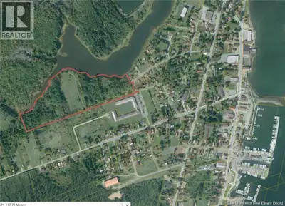 WATERFRONT DEVELOPMENT OPPORTUNITY IN THE HEART OF RICHIBUCTO! This exceptional waterfront property...