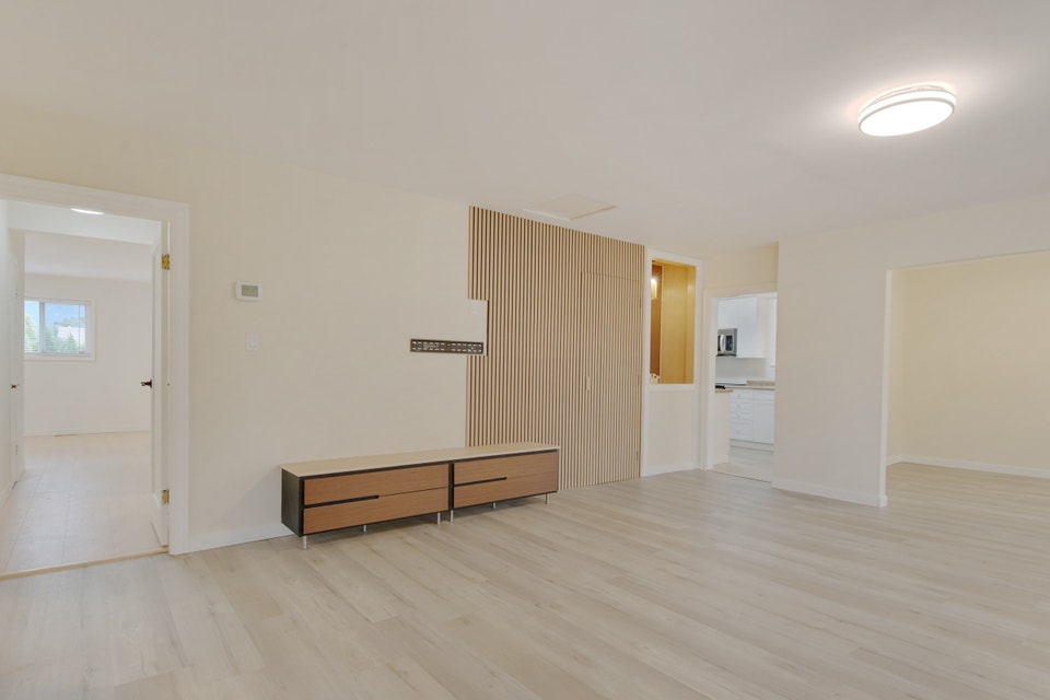Spacious 3 Bedroom Upper Suite with Private Garage & Workshop in 4