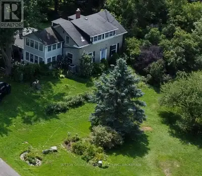 This charming limestone home, only 20 minutes from downtown Kingston, was built in the 1820s and sit...