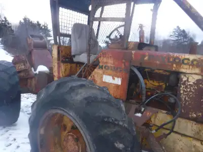 For sale: I have a S7 skidder for parts 172 Ford gas engine,wheels and 16.9x30 tires,complete axles...