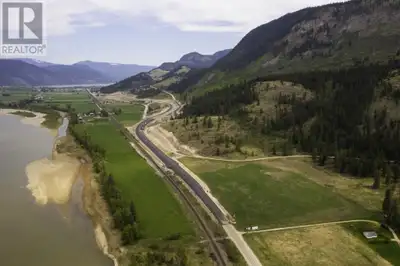 136 acre farm on the South Thompson River, 1 mile from river frontage, over 115 acres irrigated, 4 t...