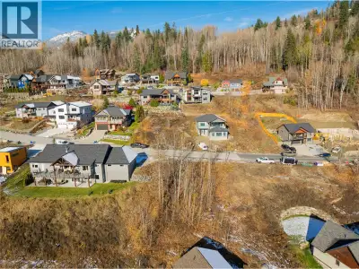 Discover your dream lot in the highly sought after Redstone community! This exceptional property boa...