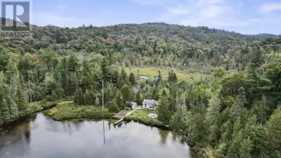 Welcome to this super cute camp on Upper Island Lake! With amazing West facing views, over 3 acres o...