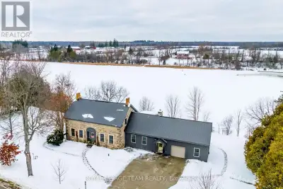 Welcome to Spillway Farm, circa 1835, a stunning waterfront stone home w/ exquisite custom renovatio...
