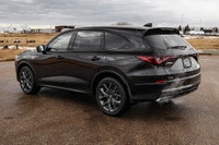 Rear Spoiler,Power Liftgate,Power Door Locks,Rain Sensing Wipers,Rear Defrost,Intermittent Wipers,Pa... (image 1)