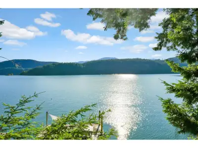 Don't miss this amazing FREEHOLD waterfront cottage on beautiful Harrison Lakel Boat Access Only - a...