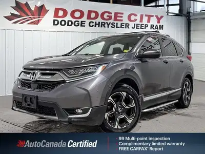 The 2018 Honda CR-V Touring AWD delivers premium comfort, advanced safety, and confident all-weather...