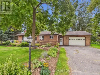 Welcome to 22 Main Street in Tiverton, a spacious 2,170 sq. ft. total living space bungalow situated...