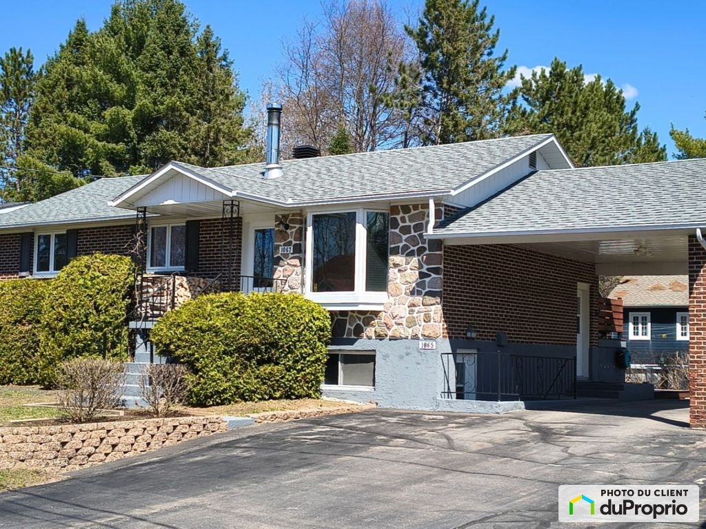 $569,000 - Bungalow for sale in Mont-Tremblant — photo 1