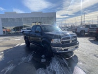 Calling all enthusiasts for this stunning and agile 2014 Ram 1500 ST. Take pleasure in the quick shi... (image 6)