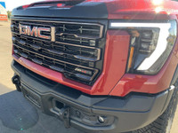 AMVIC Licensed Dealer The 2026 GMC Sierra HD AT4X AEV Edition in Volcanic Red Tintcoat is engineered... (image 2)