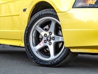 Carget Supercentre is proud to present this 2003 Ford Mustang GT Convertible! EXTERIOR: ZINC YELLOW... (image 3)