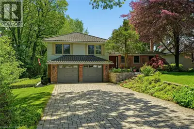 Nestled on a premium lot siding onto the prestigious Burlington Golf & Country Club, this rare oppor...