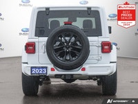 New Price! Odometer is 10286 kilometers below market average! Bright White Clearcoat 2023 Jeep Wrang... (image 4)