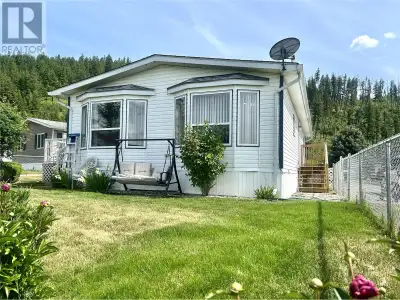 Spacious Double-Wide Home with Stunning Views in Sunset Heights 55+ MHP Perched on a prime view lot...
