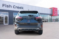 Command the road in this sleek 2023 Ford Edge Titanium, boasting a powerful Twin-Scroll 2.0L EcoBoos... (image 5)