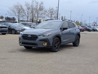 The pre-owned 2024 Subaru Crosstrek Onyx in Blue with a Grey interior delivers rugged versatility, m... (image 1)
