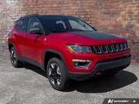 KBB.com 10 Best All-Wheel-Drive Vehicles Under $25,000. This Jeep Compass has a trusty Regular Unlea... (image 6)
