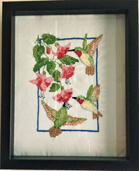 Hand cross stitched birds and flowers
