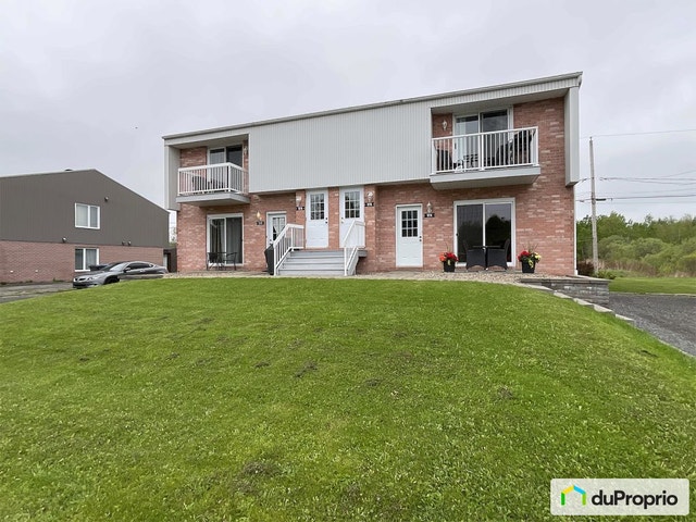 $825,000 - Quadruplex for sale in St-Redempteur — photo 1