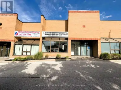 Attention Investors & Business Owners! This Tastefully Updated Industrial Condominium Offers Over 1,...