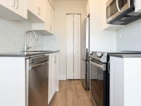 Park Towers is located at 5815 Yew Street, a first class 83-unit concrete mid-rise rental apartment... (image 1)