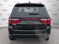 Equipped with comforting heated front seats and a heated steering wheel, this 2021 Dodge Durango SXT... (image 4)