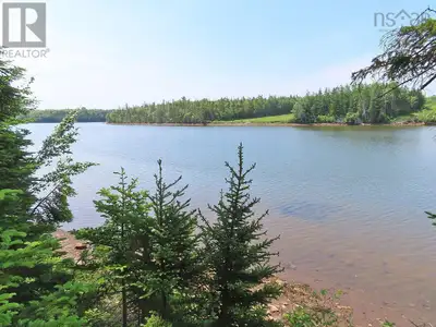 In one of the most popular regions of Cape Breton, you will find this 5.16 Acre riverfront property...