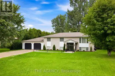Set well back behind mature trees at the edge of Elora, this raised bungalow has been comprehensivel...