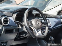 Navigate cityscapes with confidence in this sophisticated former daily rental 2024 Nissan Versa SV.... (image 8)