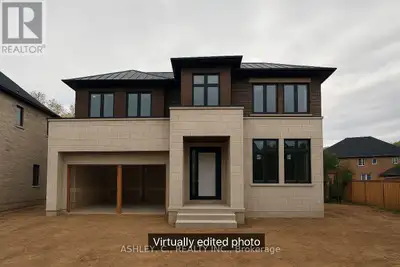 HOUSE IS BEING SOLD AS IS! Welcome to 2574 Sharon Crescent, a rare opportunity to customize a stunni...