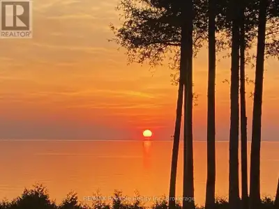 SUPER RARE OPPORTUNITY IN THE DARLING VILLAGE OF BAYFIELD! 8+ ACRES OF PRIME LAKEFRONT LAND SPORTING...
