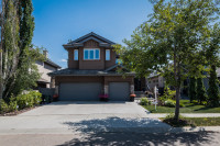GORGEOUS 2 storey home with over 4300 sqft of living space