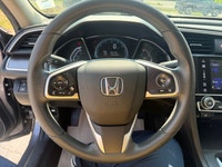 A modern compact sedan with upgraded convenience features, efficient performance, and a comfortable... (image 9)